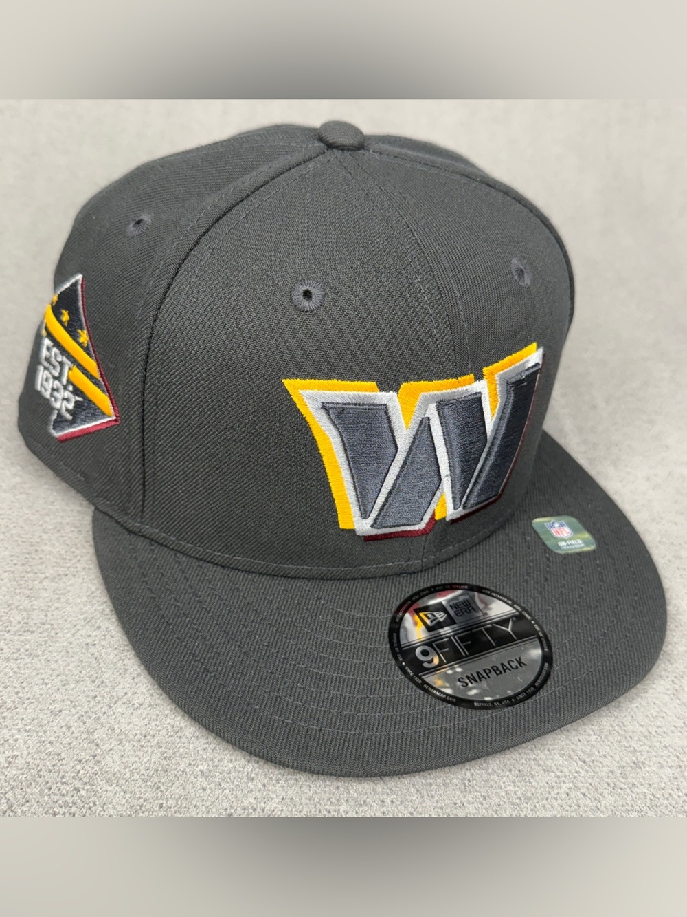 New Era Washington Commanders Hat NFL Draft 9Ffity Snapback Graphite Side Patch